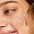 Image shows model applying Super greens to her skin on a pipette. A droplet is added to her skin with the following explaining: sinks deep into skin, rich consistency to lock in benefits and earthy organic scent.